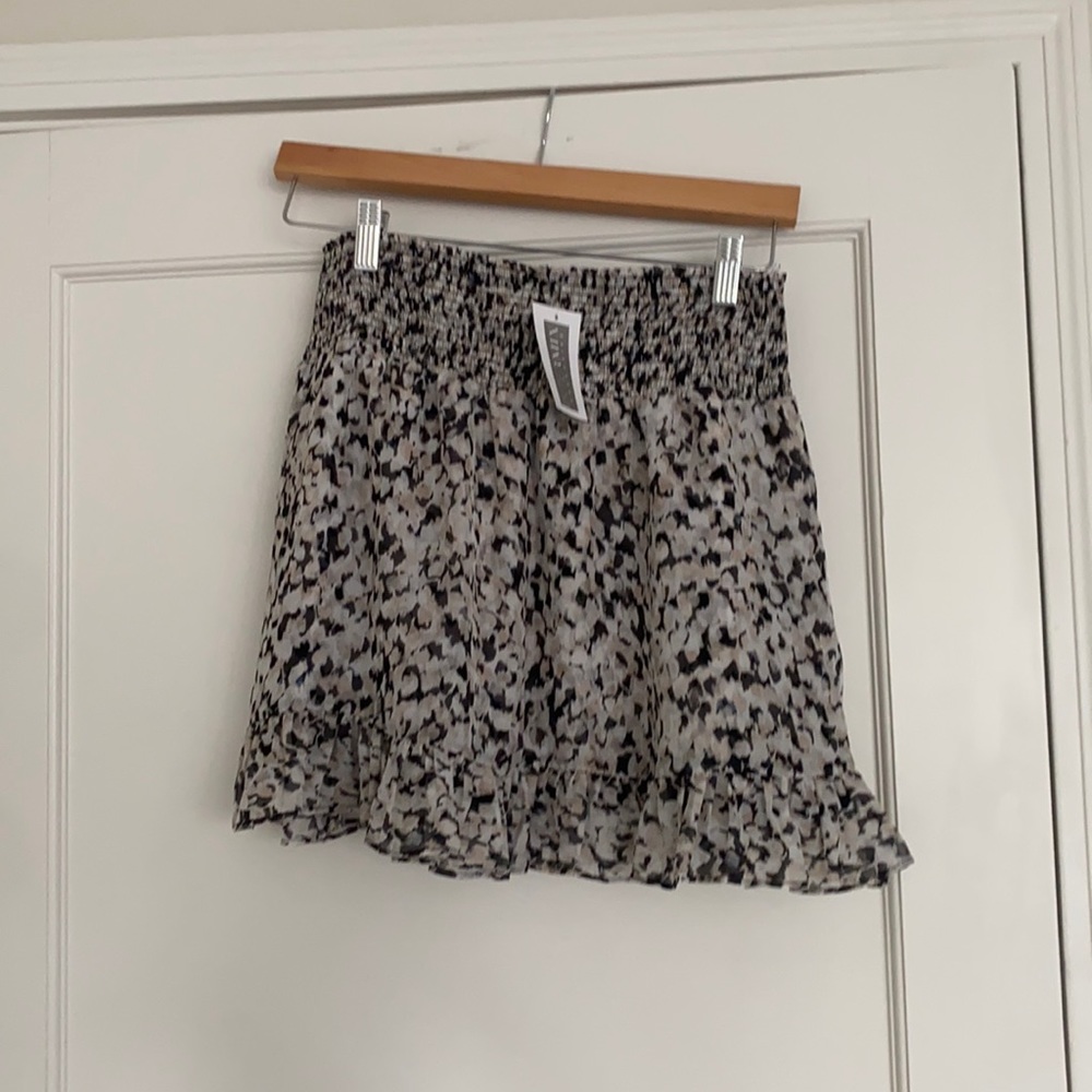 intermix mini skirt size S. never worn with tags. white/tan/black